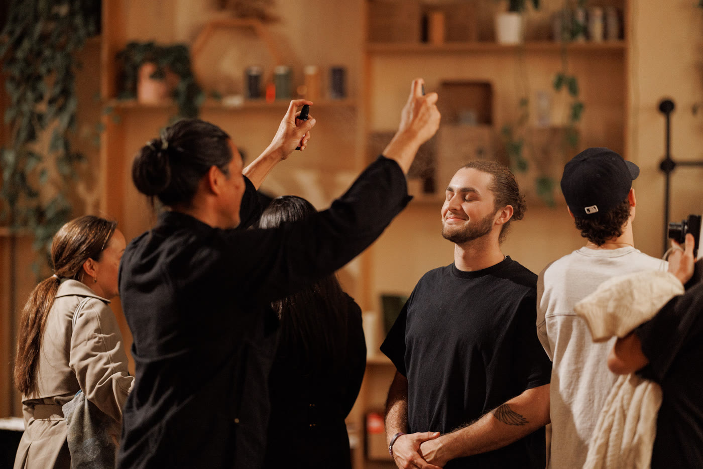 Guests trying products together at the bar